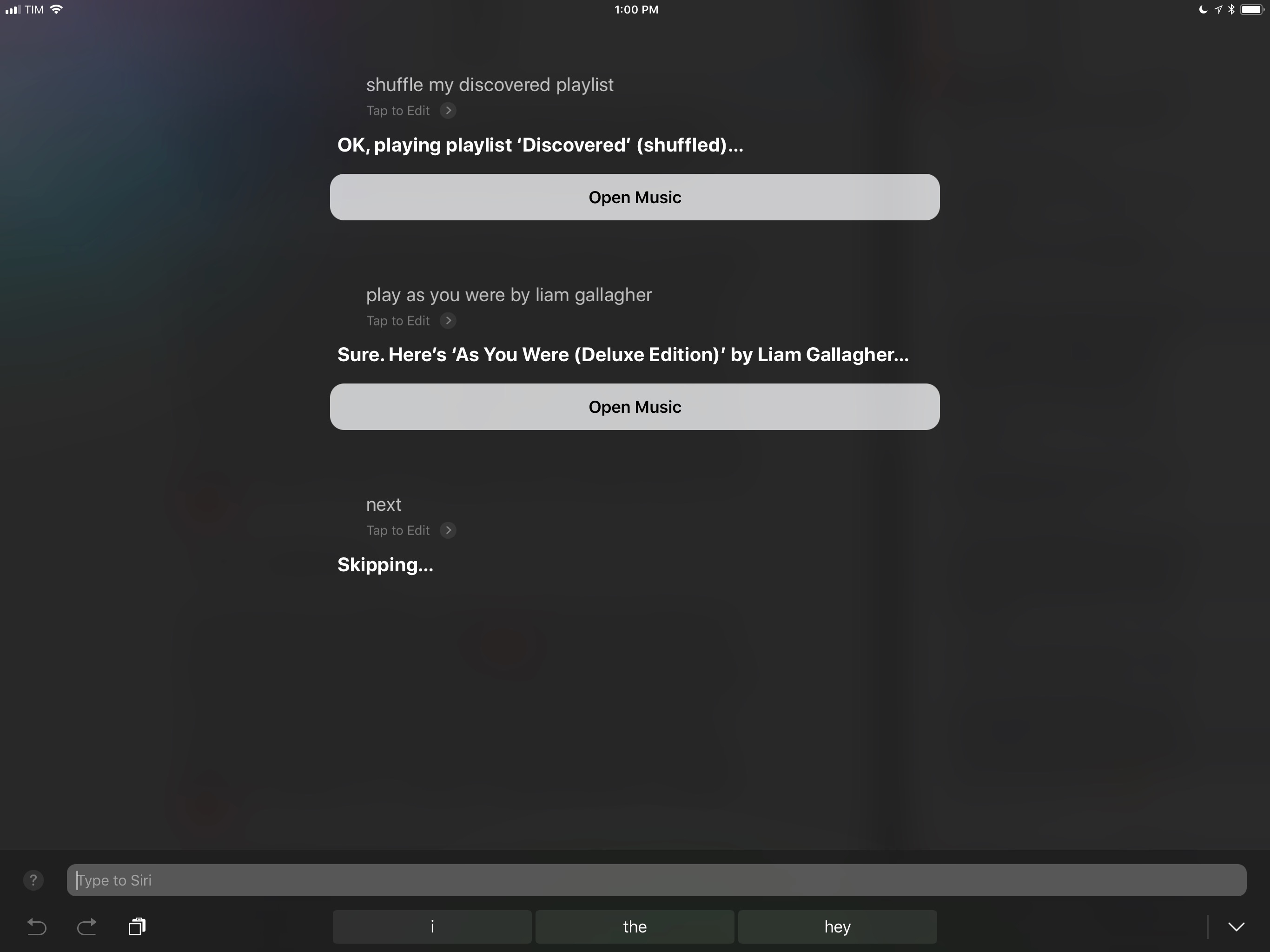 Controlling music playback with Type to Siri.
