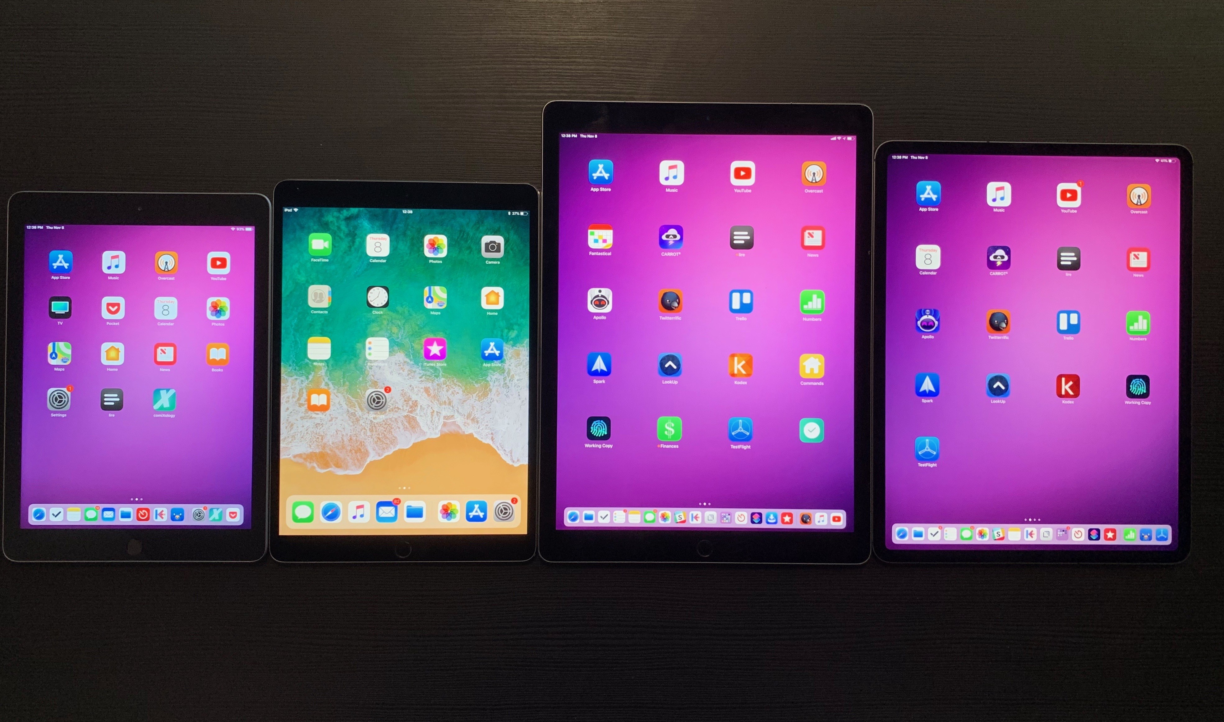 Left to right: the 6th generation iPad, 10.5" iPad Pro, 2017 12.9" iPad Pro, and the 2018 12.9" iPad Pro.