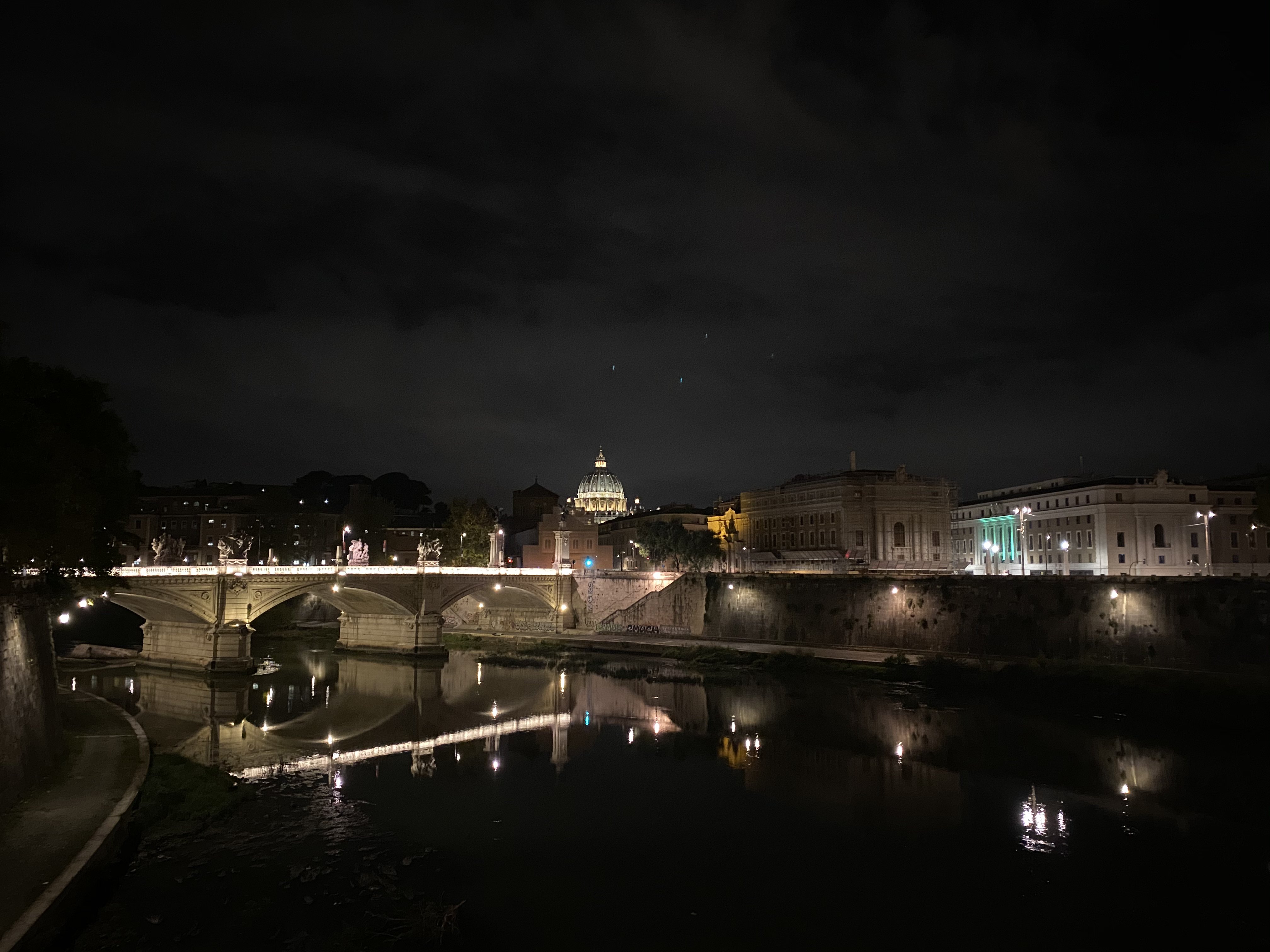 Ponte Vittorio Emanuele II, wide camera, night mode off. That’s St. Peter’s Basilica in the background.