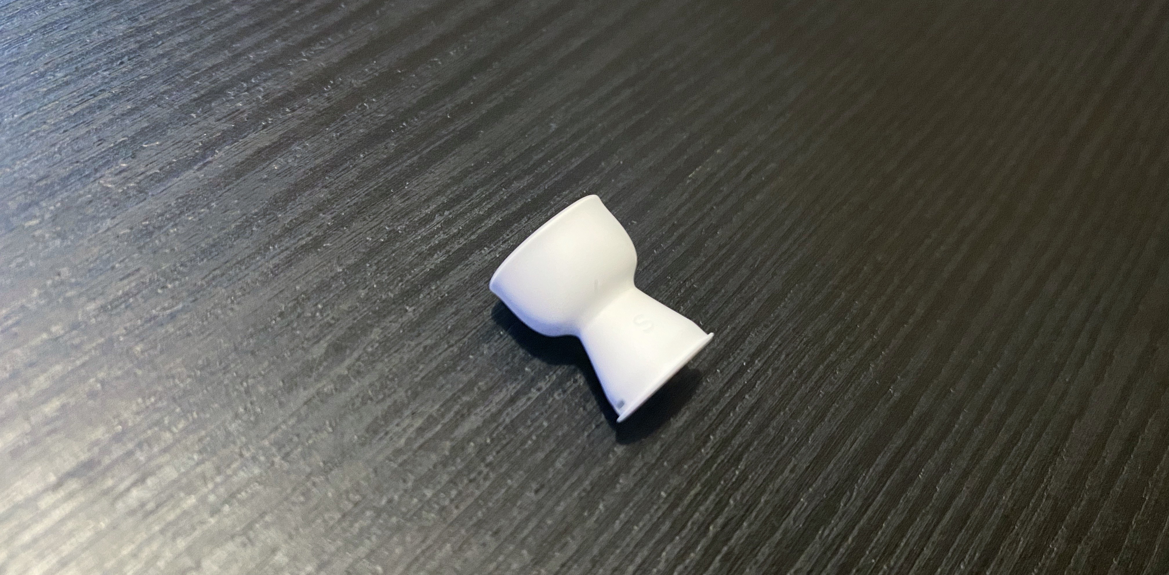 Pull out the silicone part of the AirPods Pro's tips.