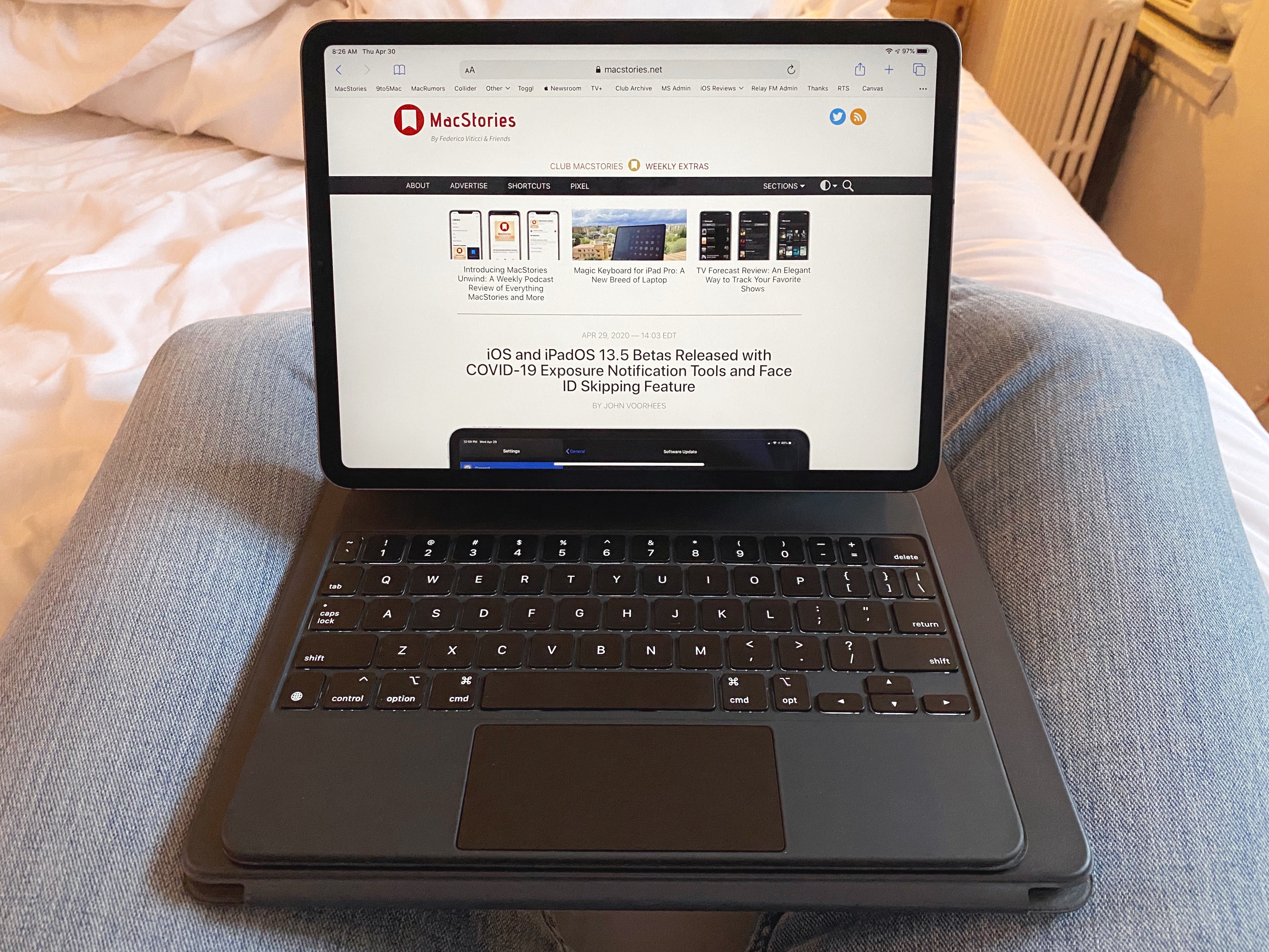 Using the 12.9-inch Smart Keyboard Folio, folded up, as a level surface for the 11-inch Magic Keyboard.