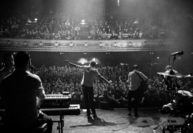Yes, that's me in the front row balcony at a Frank Turner show in 2013 refusing to sit down, shut up, and grow up.
