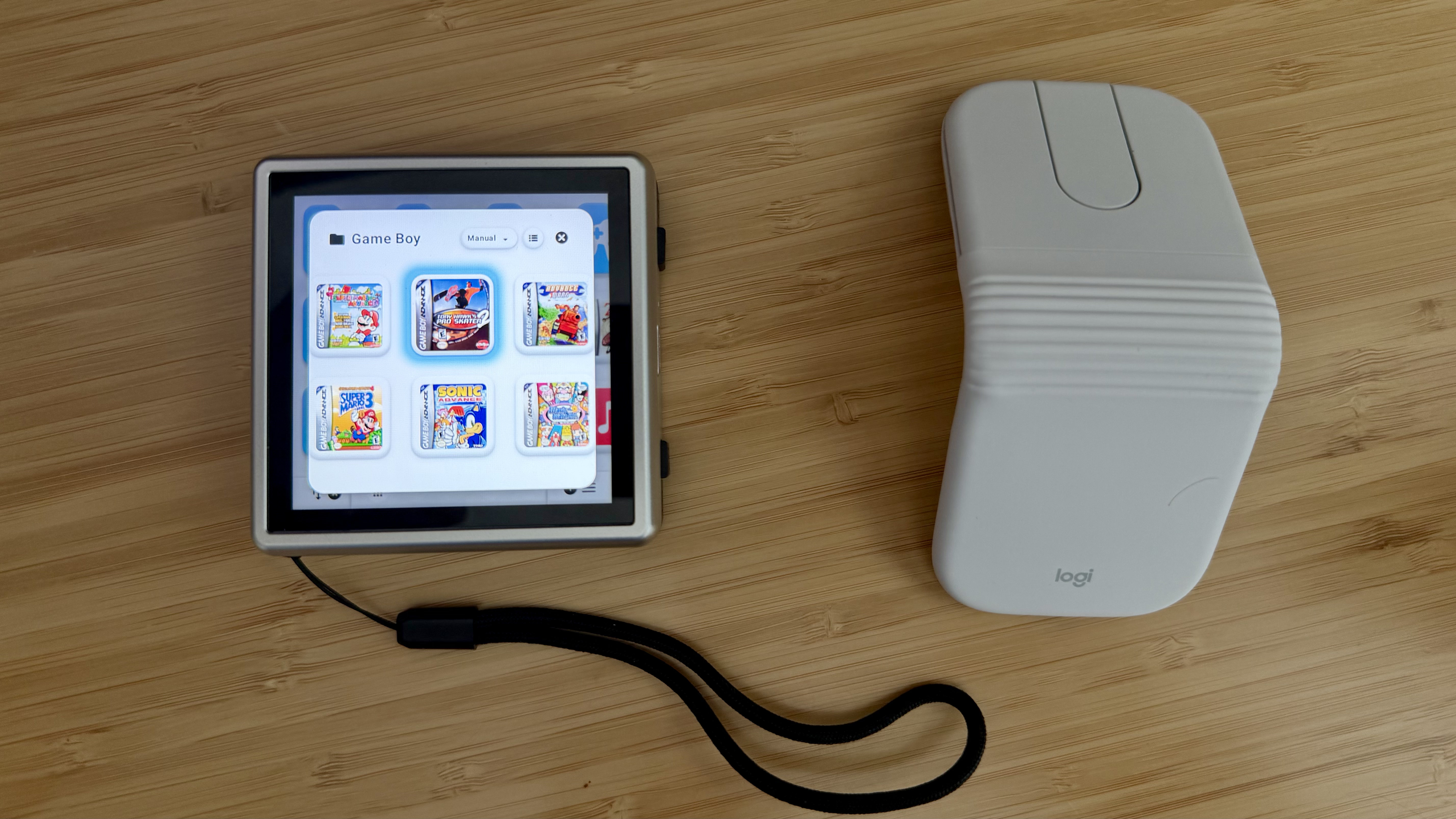The Anbernic RG Rotate and [Logitech Mobi Fold mouse](https://www.logitech.com/en-us/shop/p/mobi-fold-mouse?utm_source=Google&utm_medium=Paid-Search&utm_campaign=DEPT_FY27_Q1_USA_LO_B2C_Always-on-PWS-Base-Plan_Google_CVR_na&gclsrc=aw.ds&gad_source=1&gad_campaignid=21340350467&gbraid=0AAAAADDQ2OzdDNcFdi-Lo_HheSldaUroA&gclid=Cj0KCQjwrs7RBhDuARIsAIVfBD3p1kWAwdT-HsVtSTAXi5ft1ed_eOnGUePe8JMa3SuTOHUGFkO6rKsaAsLjEALw_wcB), which is also featured on [the Setups page](https://www.macstories.net/setups/).