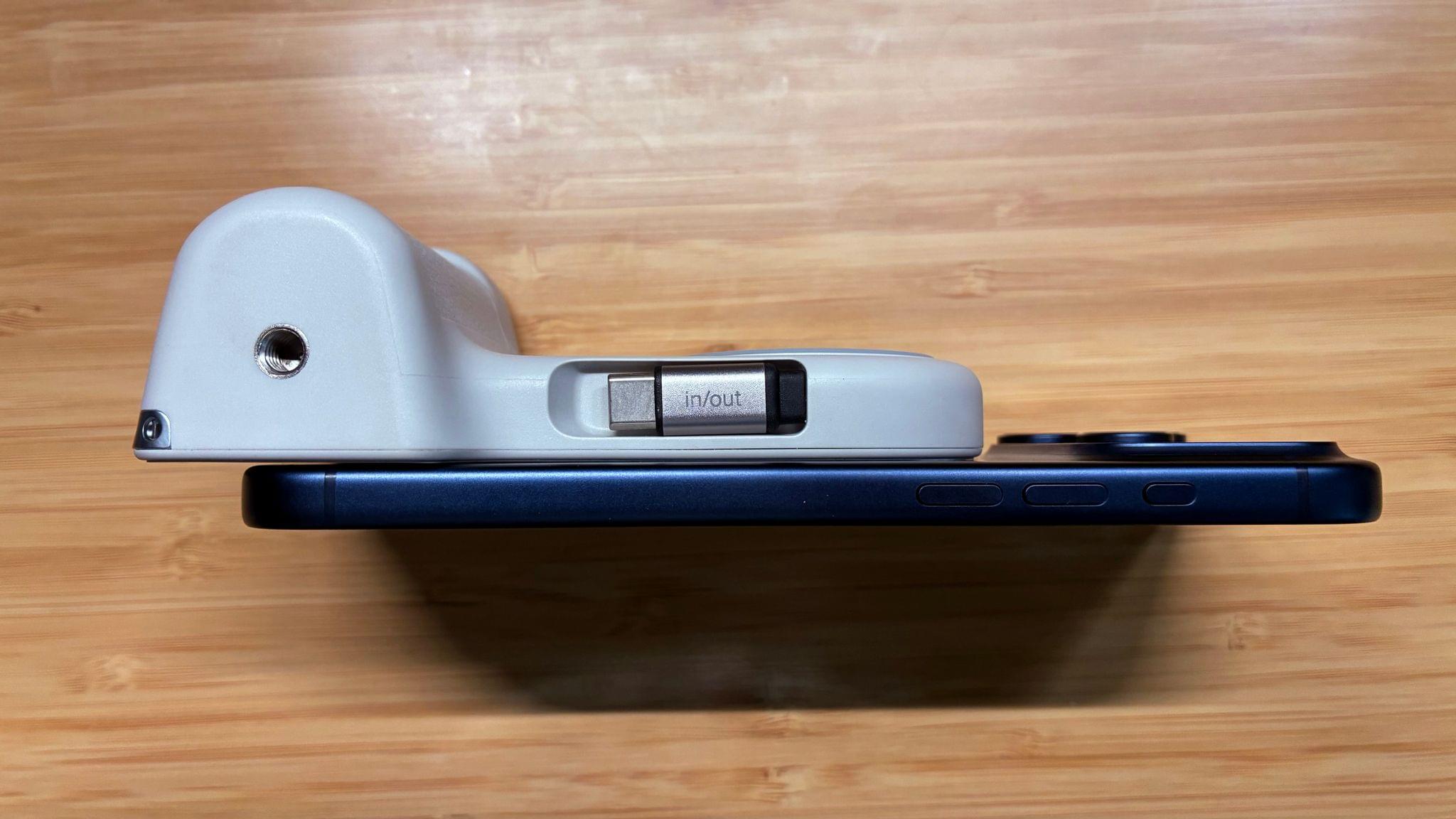 The Stage Powergrip has a tripod mounting point and a spot to connect a lanyard.