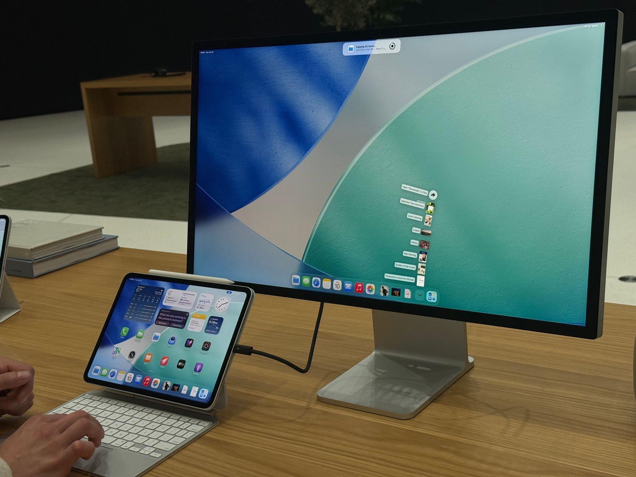 iPadOS 26 still doesn't support clamshell mode when an iPad is connected to an external display, but other improvements like folders in the dock and background tasks (pictured) are welcome. Source: Apple.