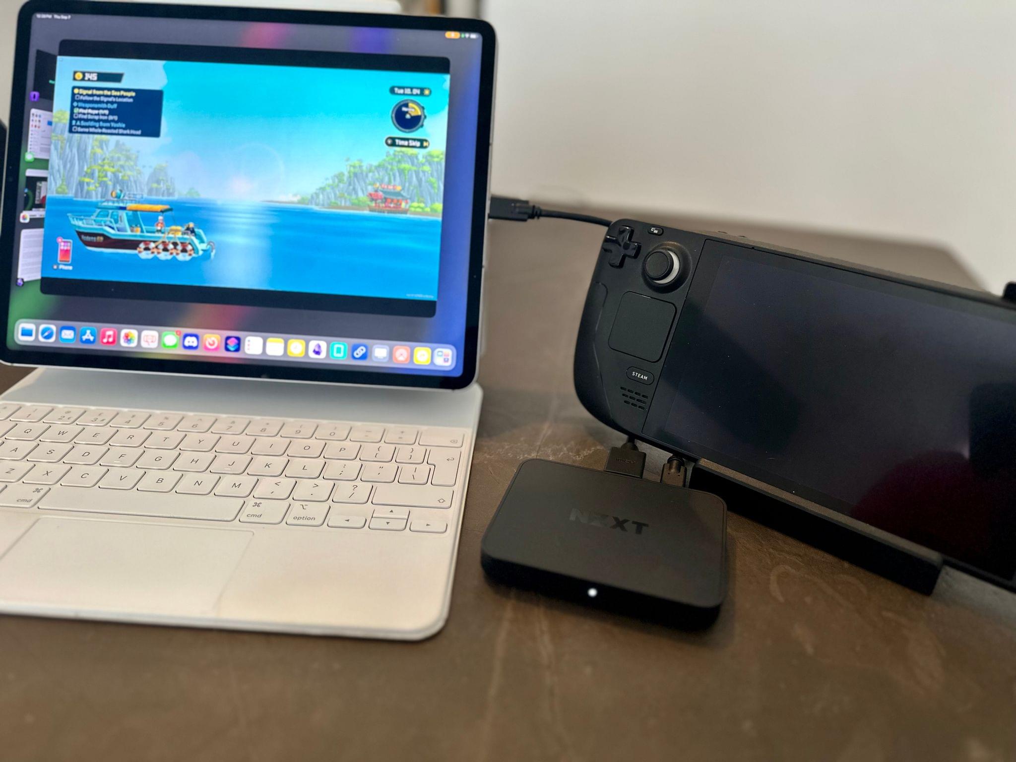 iPad Pro, Steam Deck with dock, and NZXT capture card.