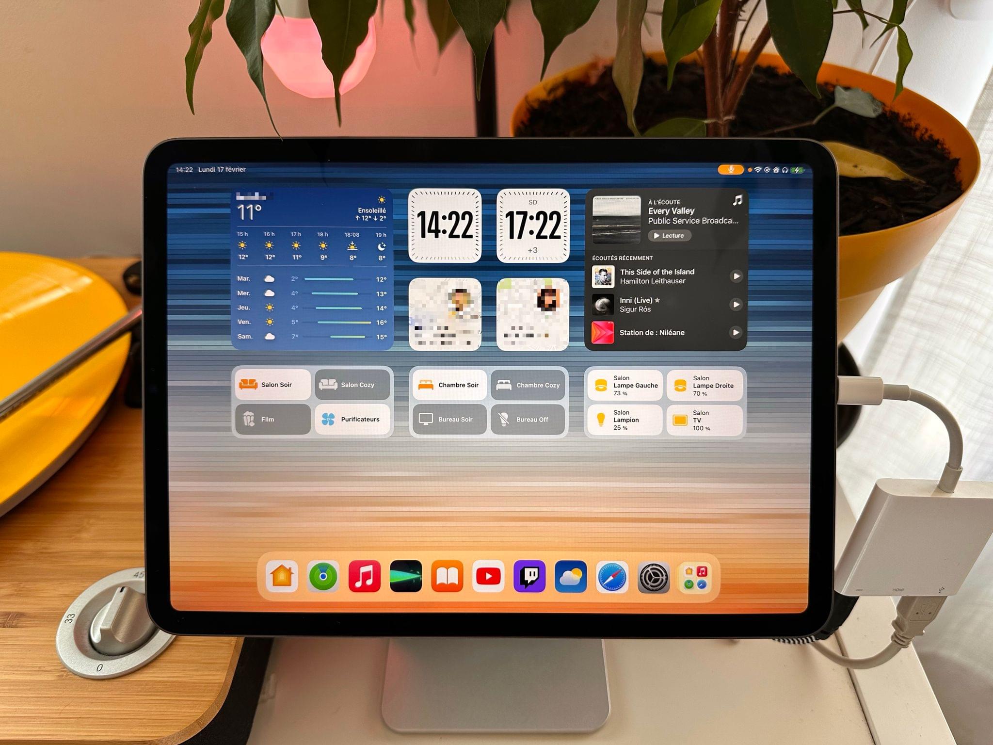 The iPad acts as a HomeKit dashboard with Home widgets directly accessible from the Home Screen.